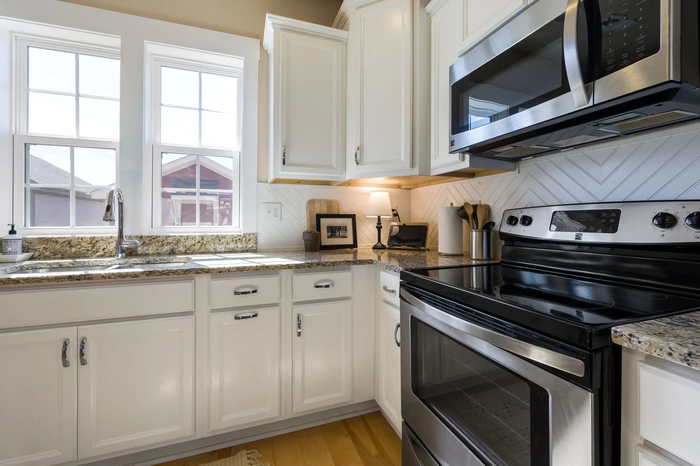 Bright kitchen with white cabinets
